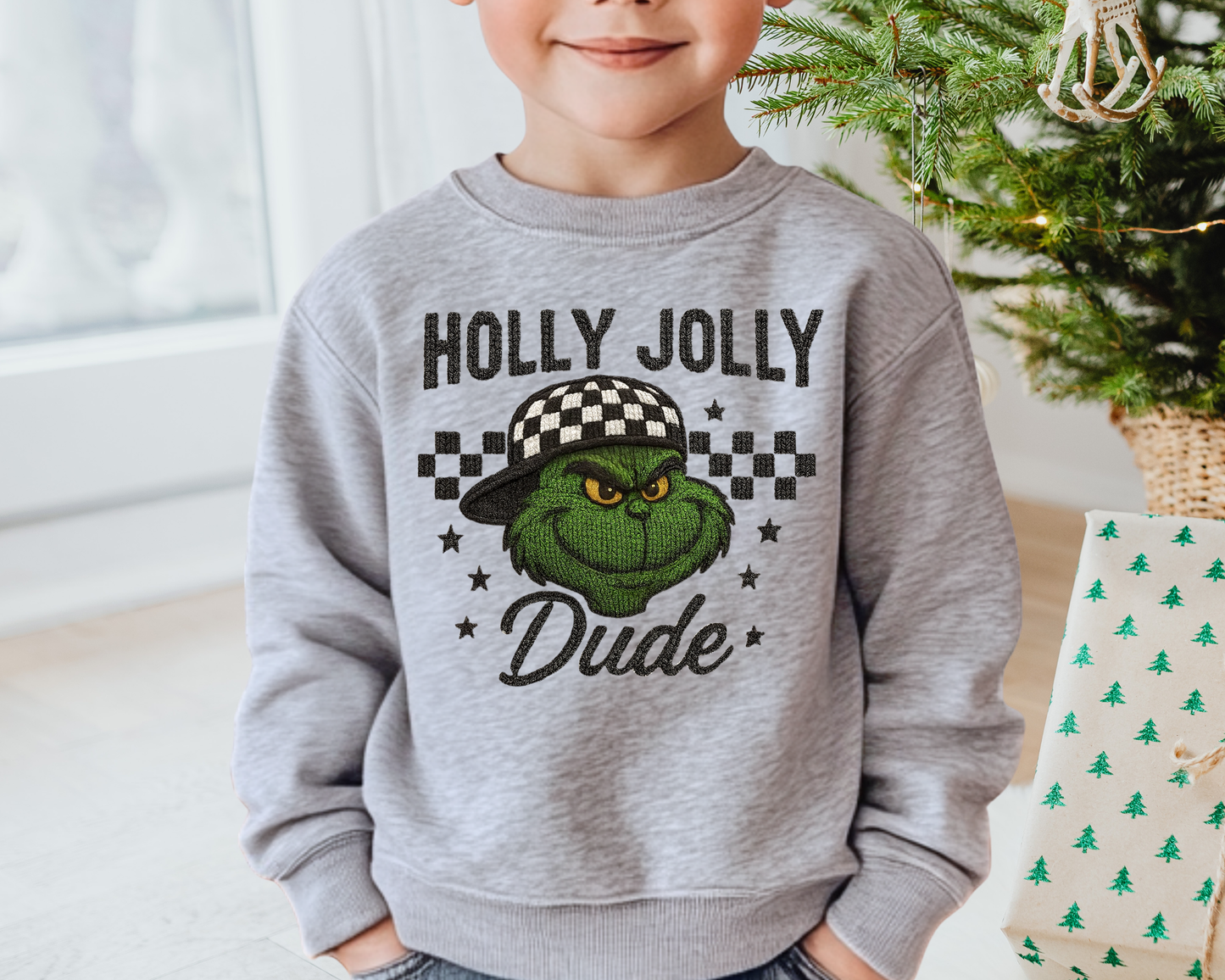 Your Just found the cutest Boy Christmas sweatshirt for the holiday season! This cozy Boy Holly Jolly Dude Grinch with Backwards Hat sweatshirt is perfect for your trendy little one.