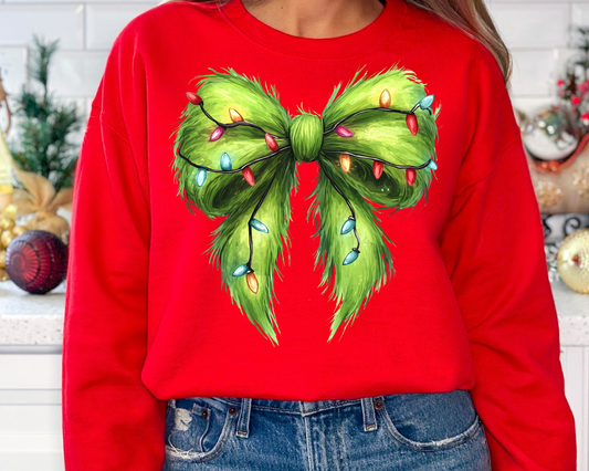 You Just found the cutest Christmas sweatshirt for the holiday season! This cozy Green Faux Grinch Bow Christmas Sweatshirt is perfect for kids and adult or a mommy and me matching Christmas sweatshirt